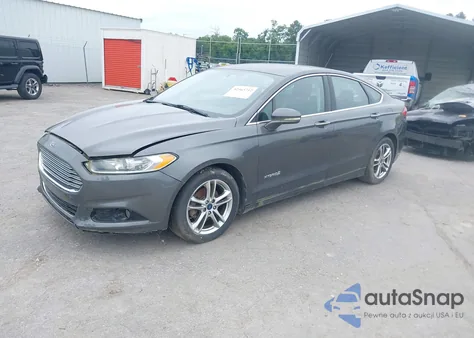 2015 Ford Fusion Hybrid Titanium z USA, uszkodzony, nr VIN 3FA6P0RU0FR117779